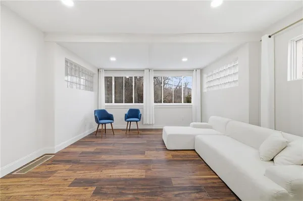 a living room with furniture and a table