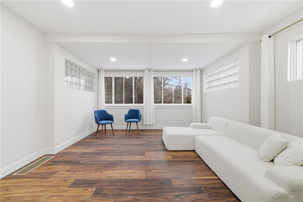 3 3rd Avenue Braddock, PA 15104 - Photo 10 of 46 a living room with furniture and a table
