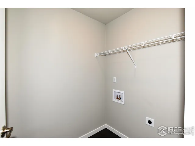 a view of small space with racks on the wall