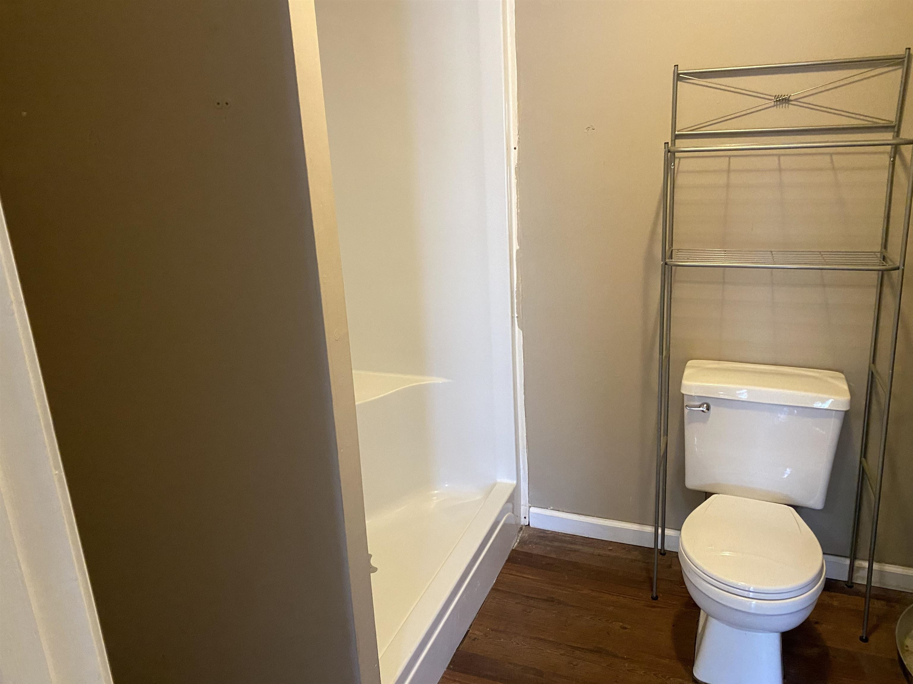 402 West Mill Street Rutherford, TN 38369 - Photo 3 of 5 a bathroom with a toilet and a shower