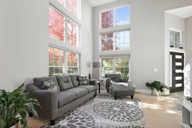 a view of a dining room with furniture and window
