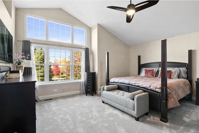 a bathroom with a sink vanity toilet and shower