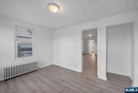 a view of livingroom with hardwood floor and window