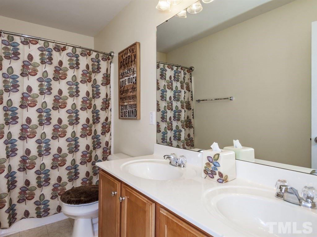 300 Hope Valley Road Knightdale, NC 27545 - Photo 19 of 25 a bathroom with a sink toilet and a mirror
