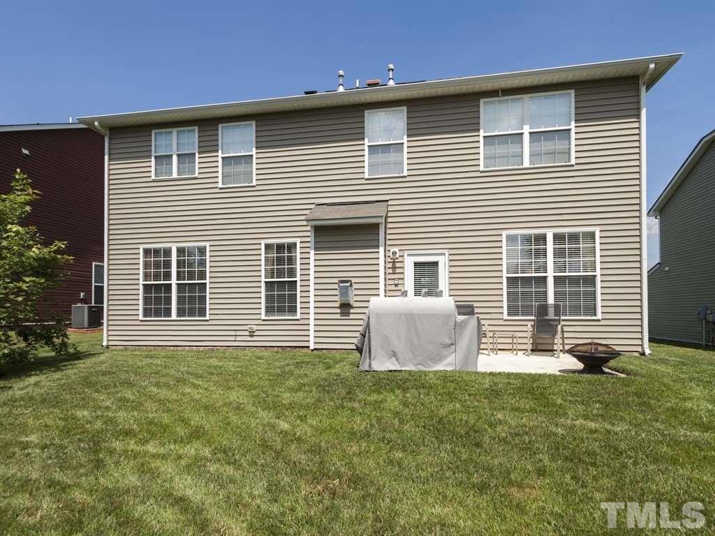 300 Hope Valley Road Knightdale, NC 27545 - Photo 25 of 25 a front view of a house with a garden