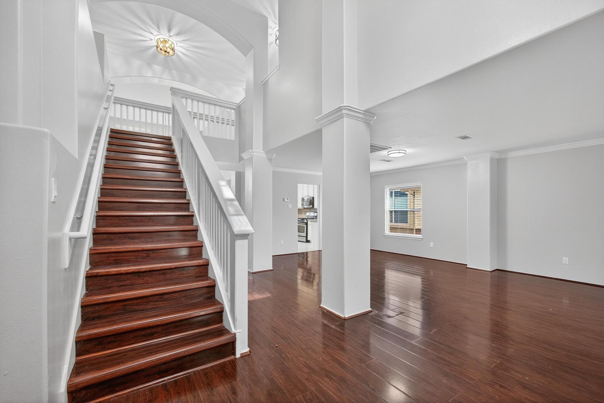 a view of entryway with wooden floor