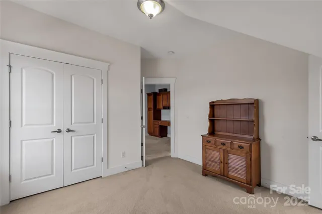 a view of kitchen and hall with furniture