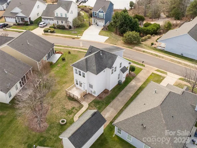 an aerial view of a highlighted house