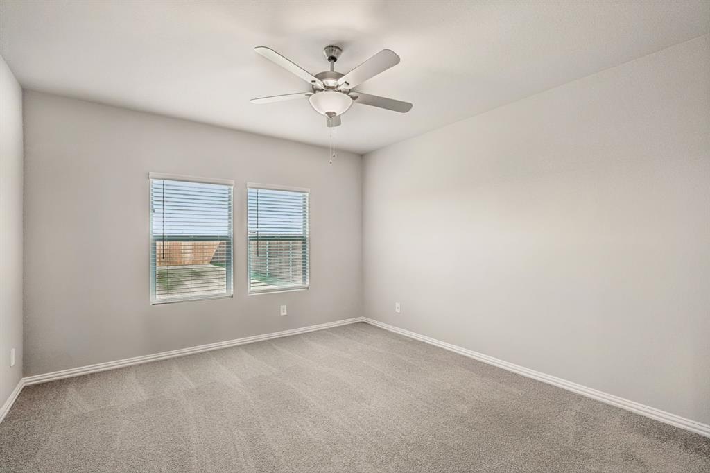 1712 Arches Road Anna, TX 75409 - Photo 16 of 37 an empty room with a window