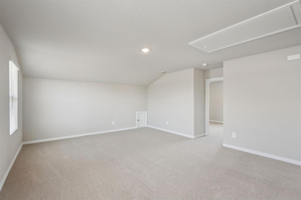 1712 Arches Road Anna, TX 75409 - Photo 26 of 37 an empty room with an entryway