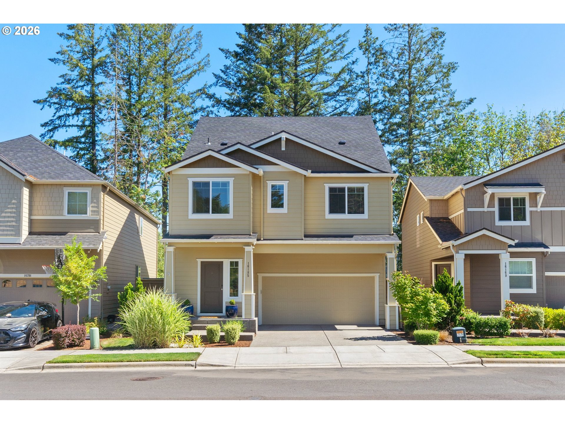 16185 Northwest Liberty Street Portland, OR 97229 - Photo 1 of 33 a front view of a house with a yard