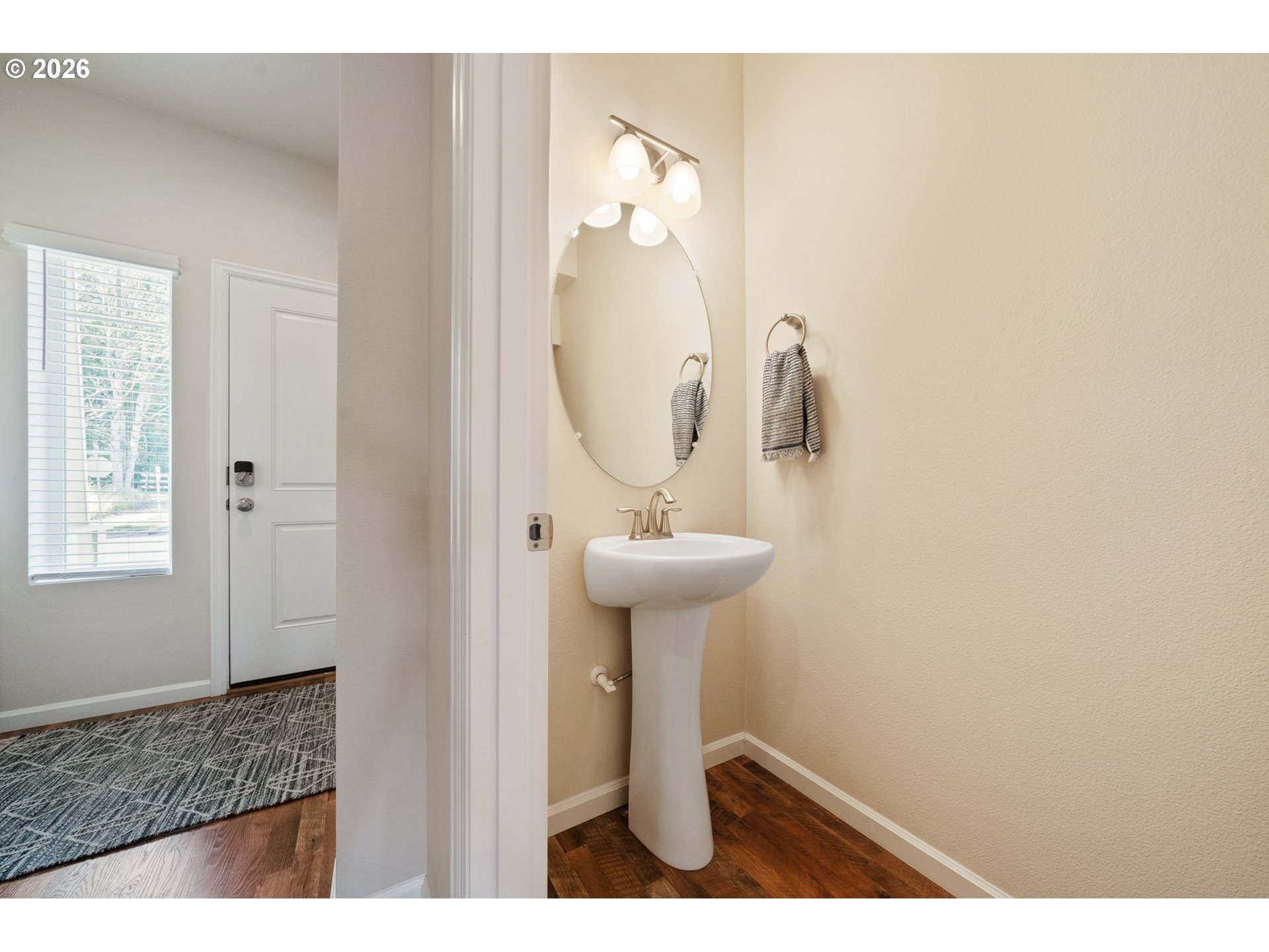 16185 Northwest Liberty Street Portland, OR 97229 - Photo 14 of 33 a bathroom with a sink a mirror and a window