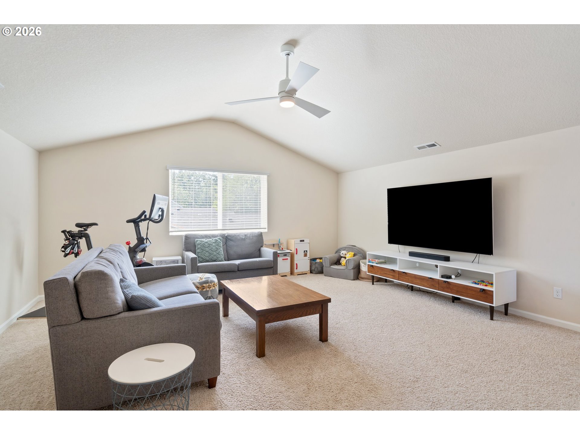 16185 Northwest Liberty Street Portland, OR 97229 - Photo 15 of 33 a living room with furniture and a flat screen tv