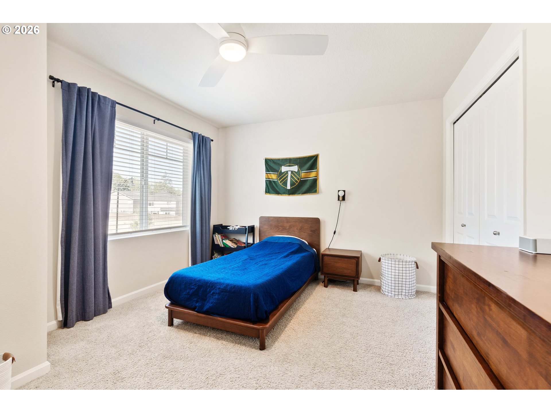 16185 Northwest Liberty Street Portland, OR 97229 - Photo 20 of 33 a living room with furniture a bed and a window