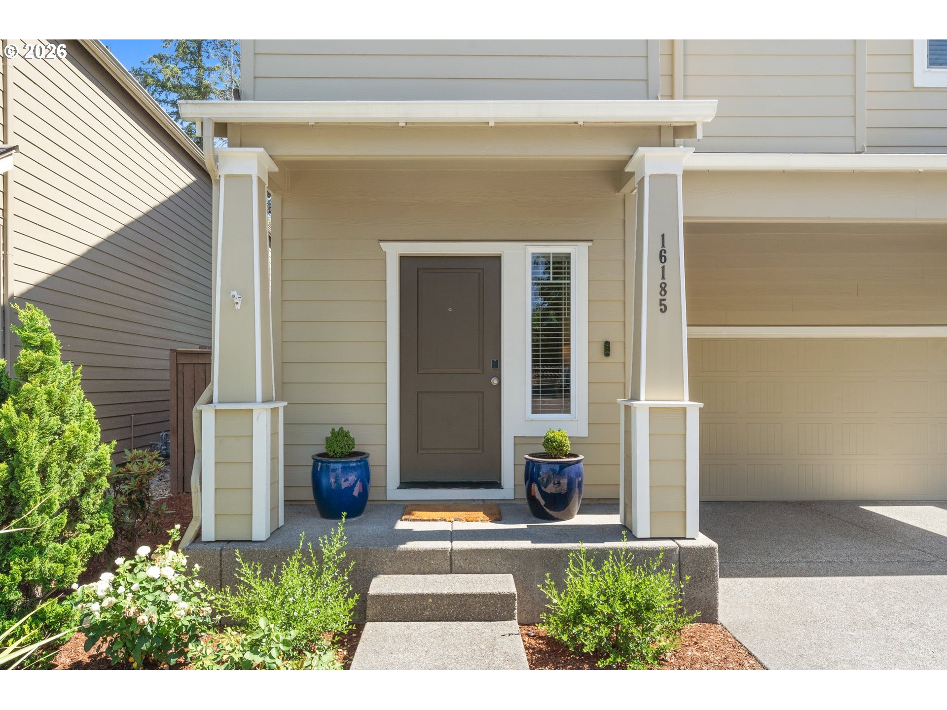 16185 Northwest Liberty Street Portland, OR 97229 - Photo 2 of 33 a view of a house with potted plants