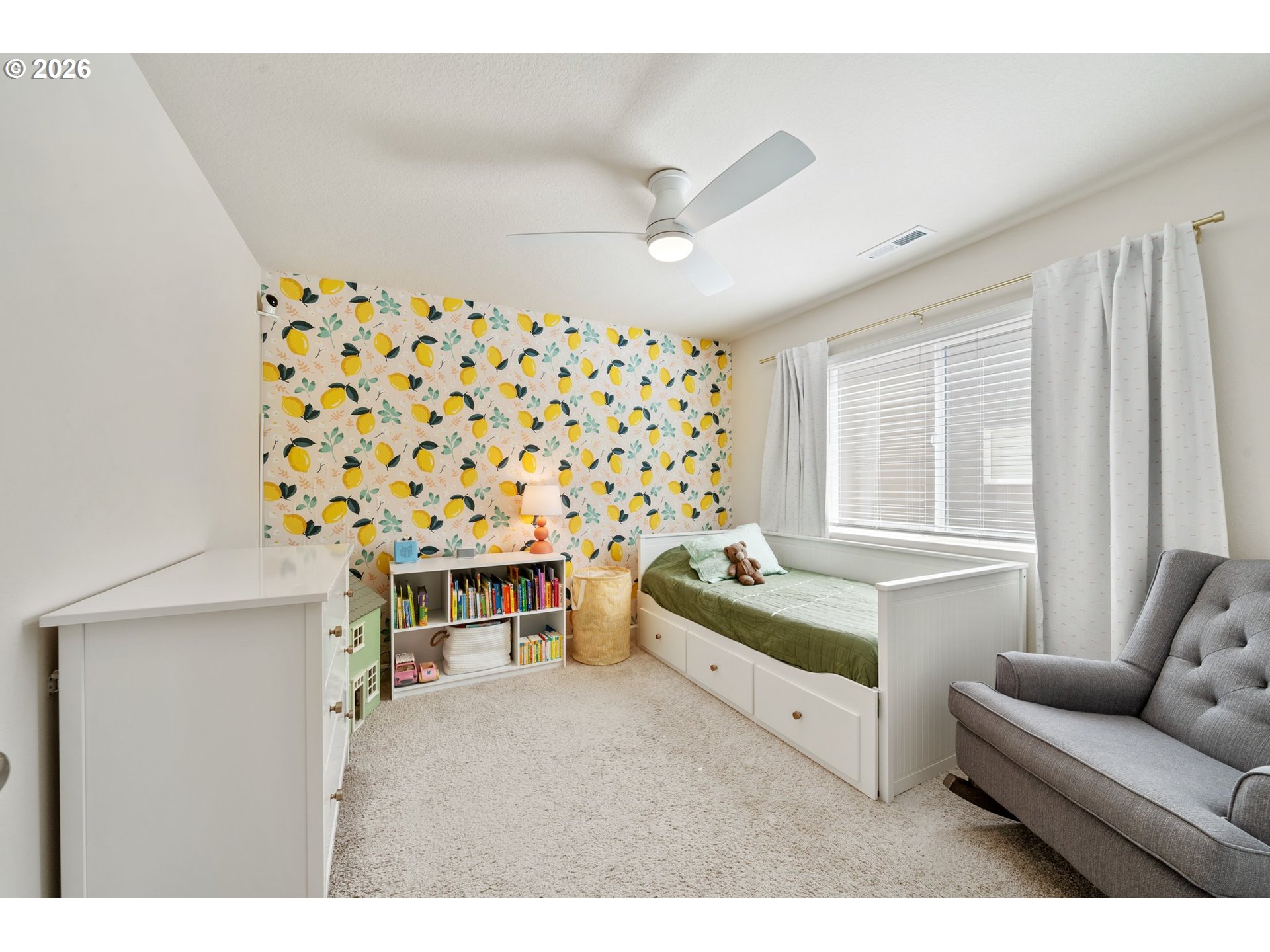 16185 Northwest Liberty Street Portland, OR 97229 - Photo 22 of 33 a living room with a baby crib furniture and a window