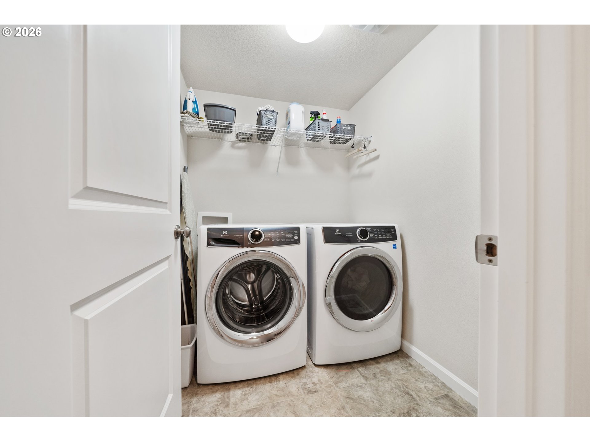 16185 Northwest Liberty Street Portland, OR 97229 - Photo 25 of 33 a utility room with dryer and washer