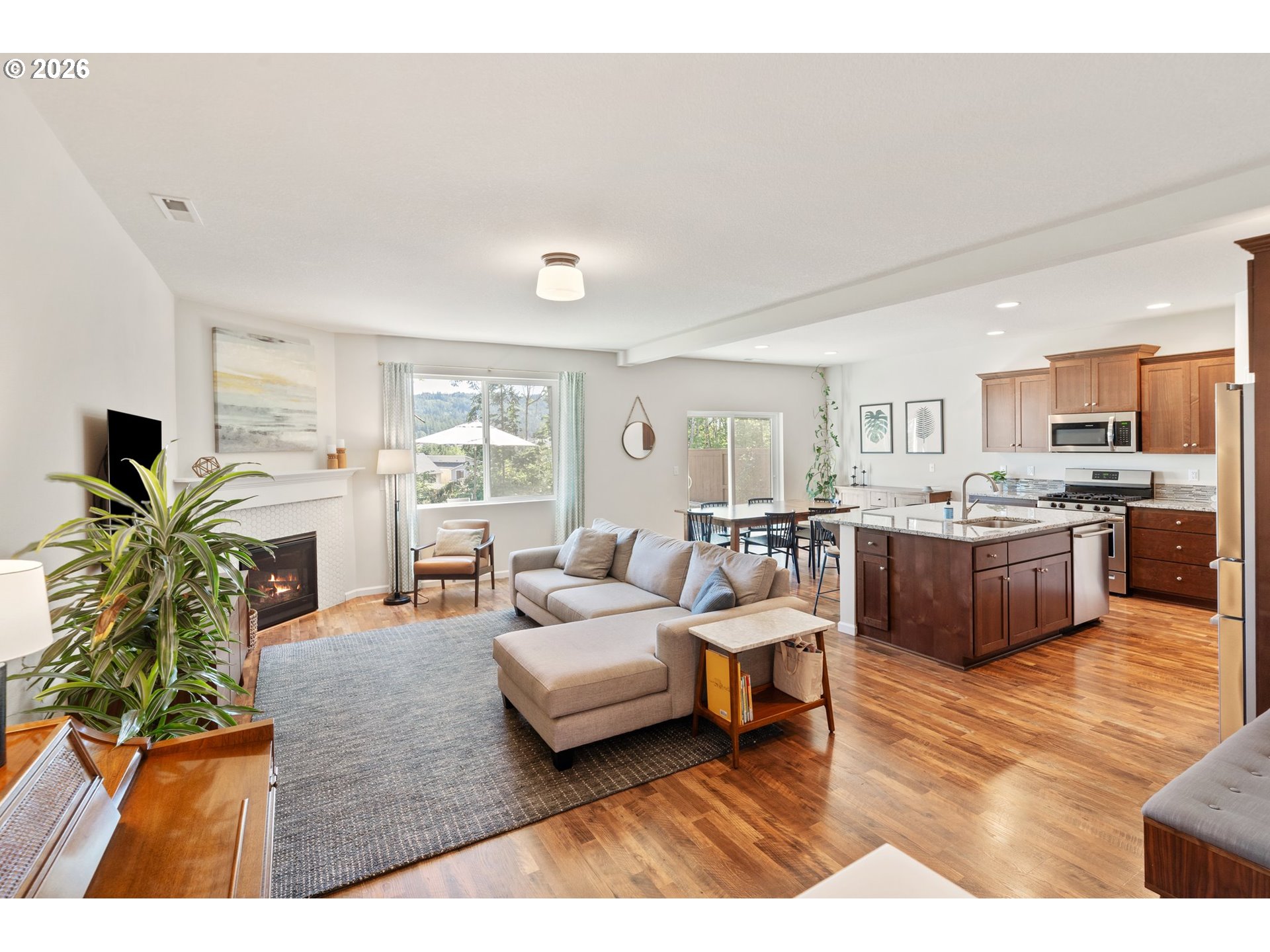 16185 Northwest Liberty Street Portland, OR 97229 - Photo 7 of 33 a living room with furniture and a large window