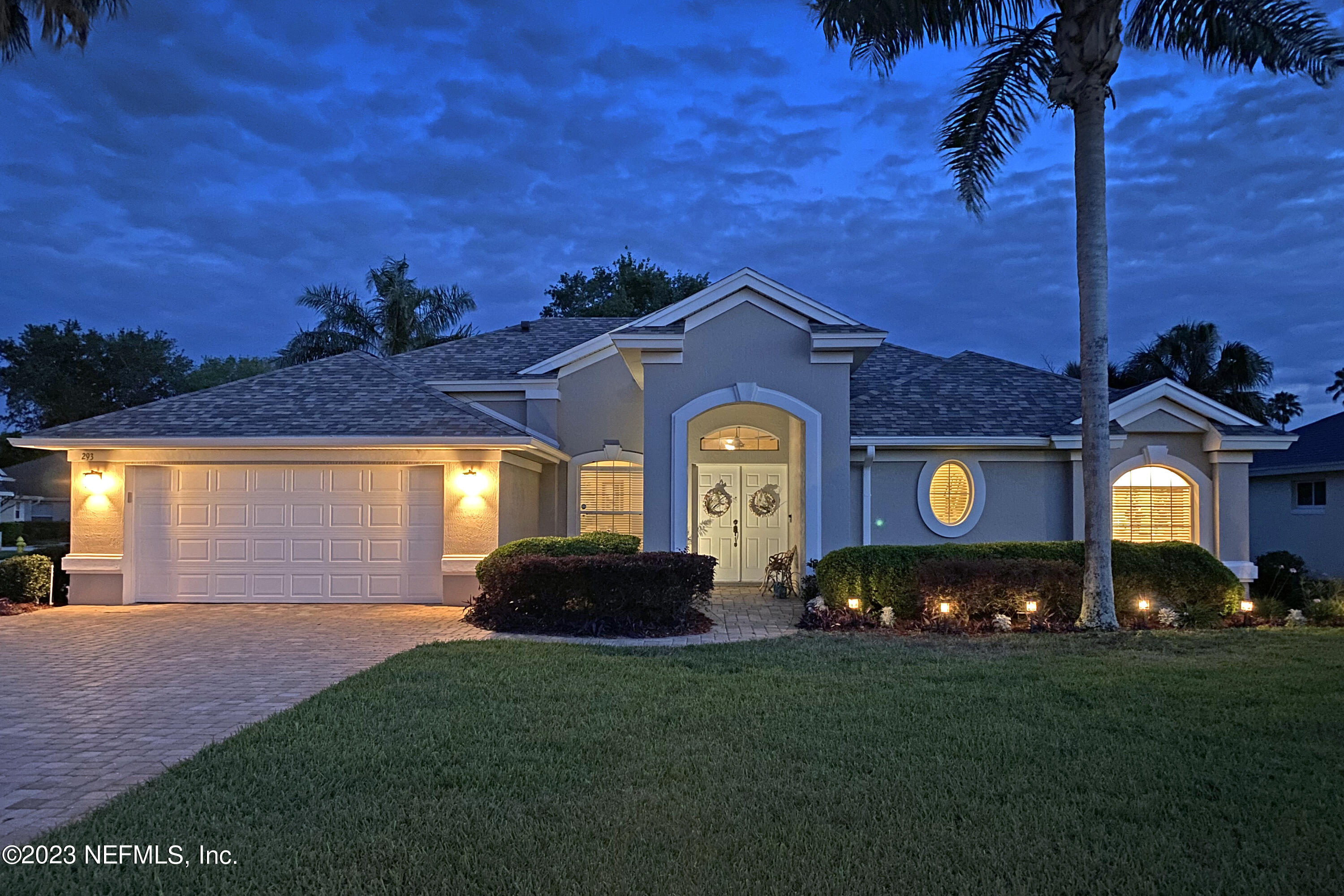 293 San Nicolas Way St. Augustine, FL 32080 - Photo 1 of 51 a front view of a house with a garden