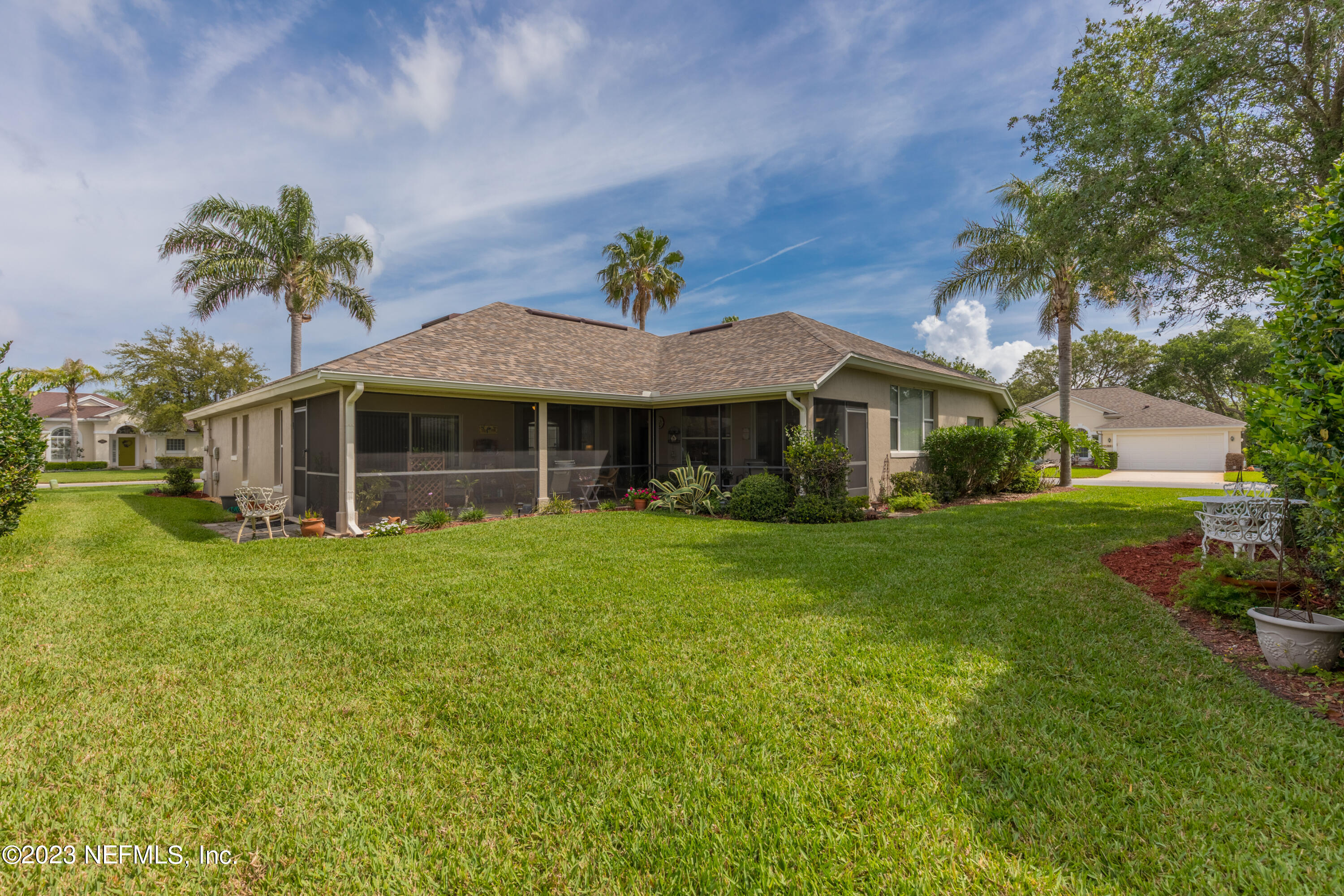 293 San Nicolas Way St. Augustine, FL 32080 - Photo 23 of 51 a front view of a house with a garden