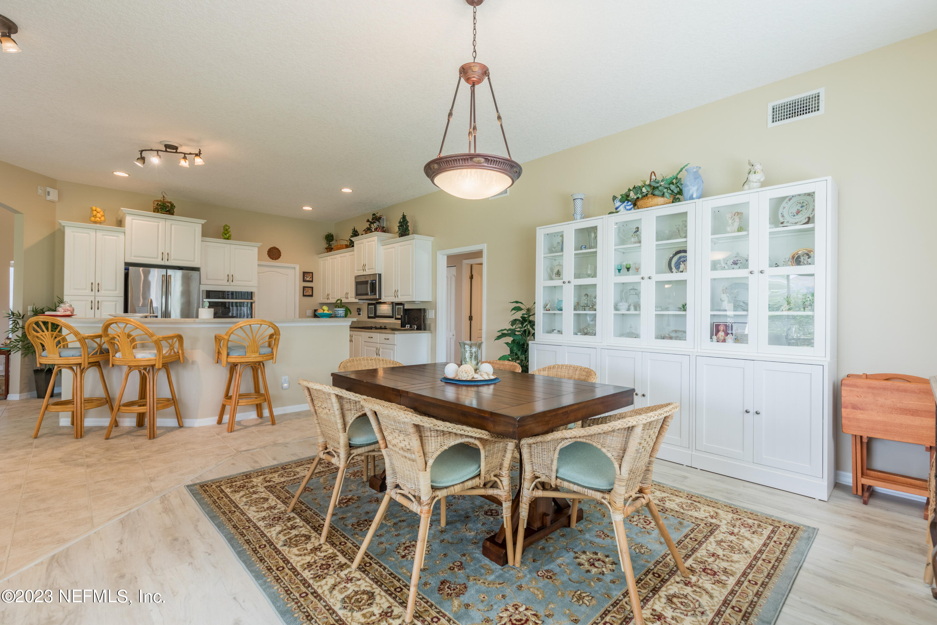 293 San Nicolas Way St. Augustine, FL 32080 - Photo 25 of 51 a view of a dining room with furniture and chandelier