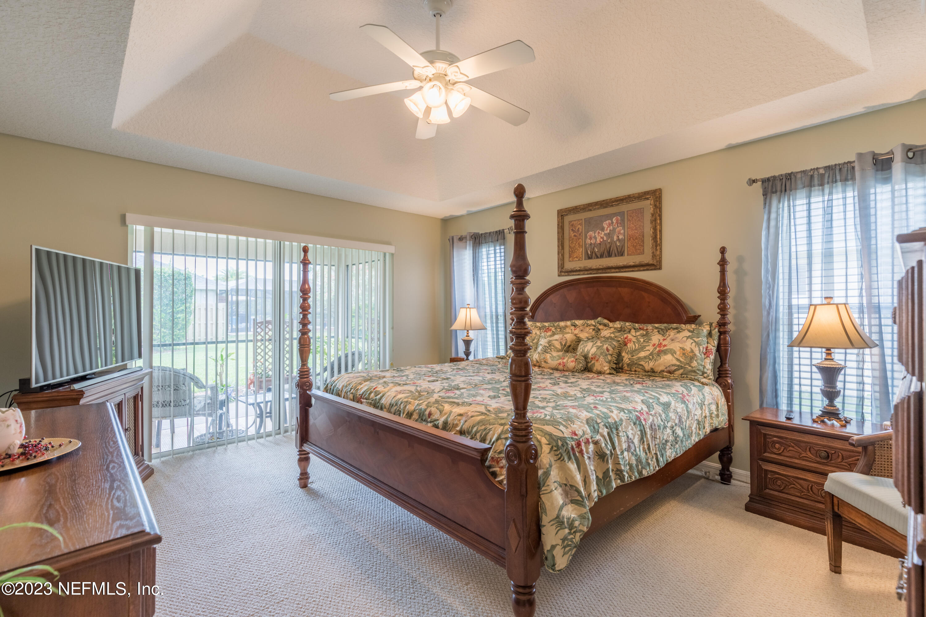 293 San Nicolas Way St. Augustine, FL 32080 - Photo 26 of 51 a bedroom with a bed couch and a window