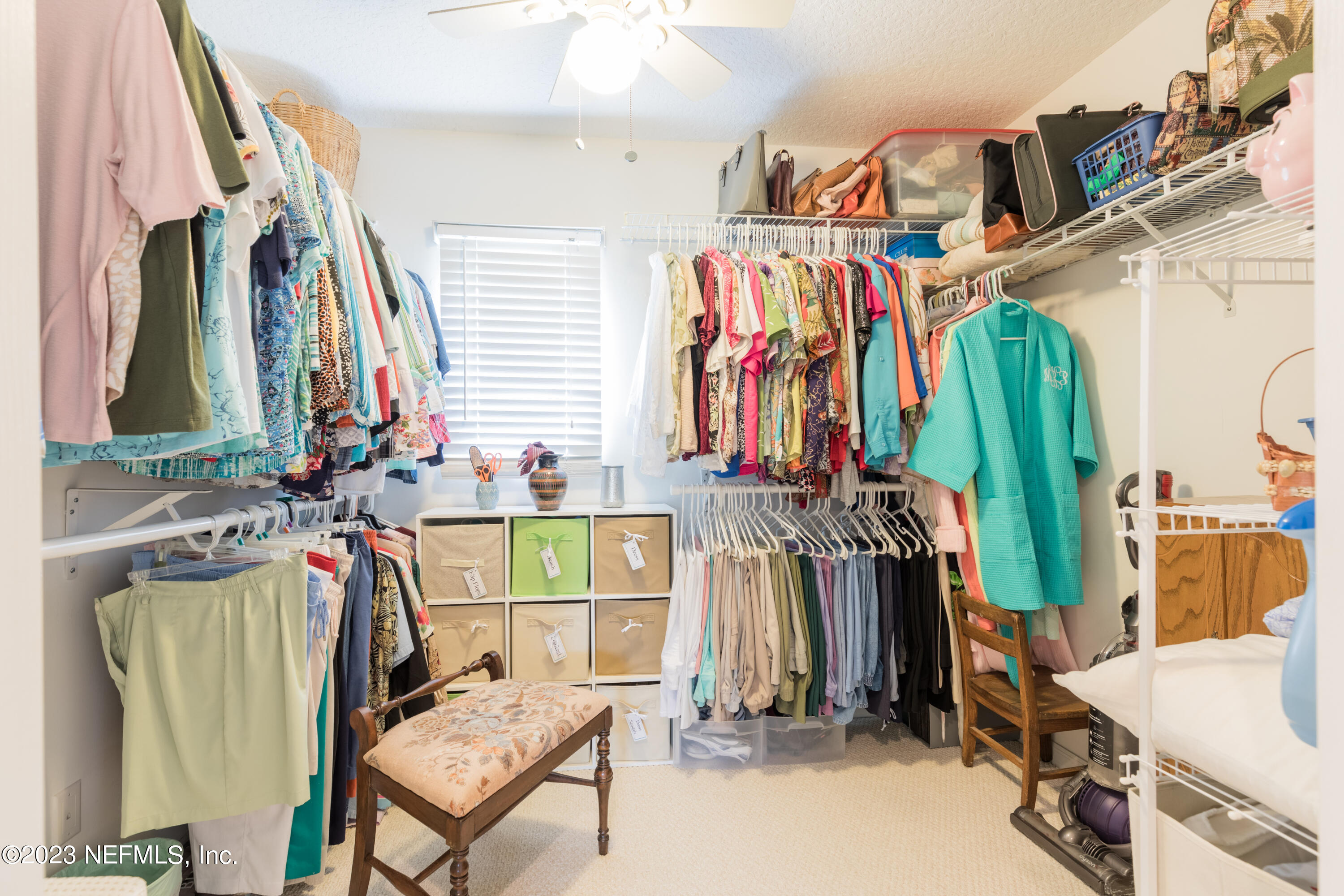 293 San Nicolas Way St. Augustine, FL 32080 - Photo 33 of 51 a view of walk in closet with clothes