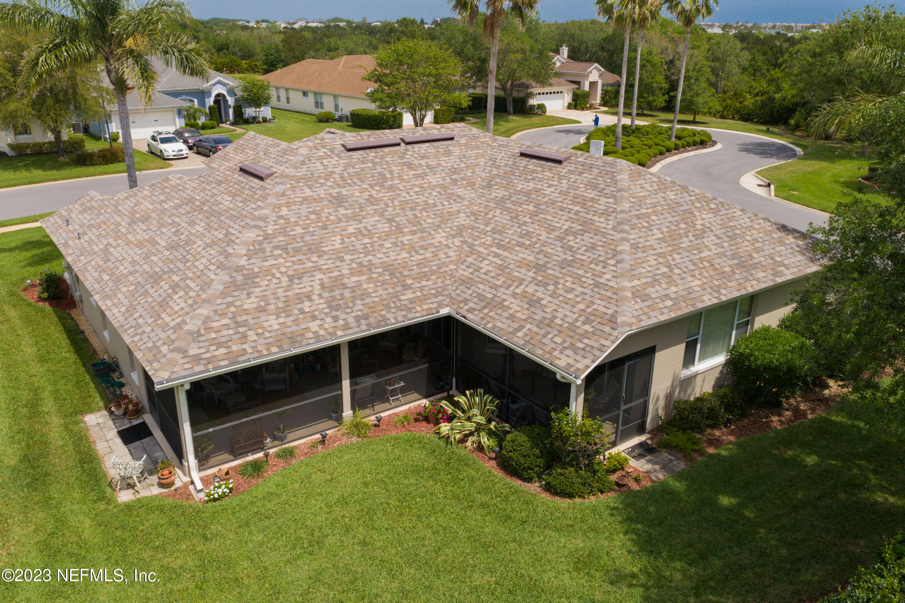 293 San Nicolas Way St. Augustine, FL 32080 - Photo 42 of 51 an aerial view of a house with a yard and lake view