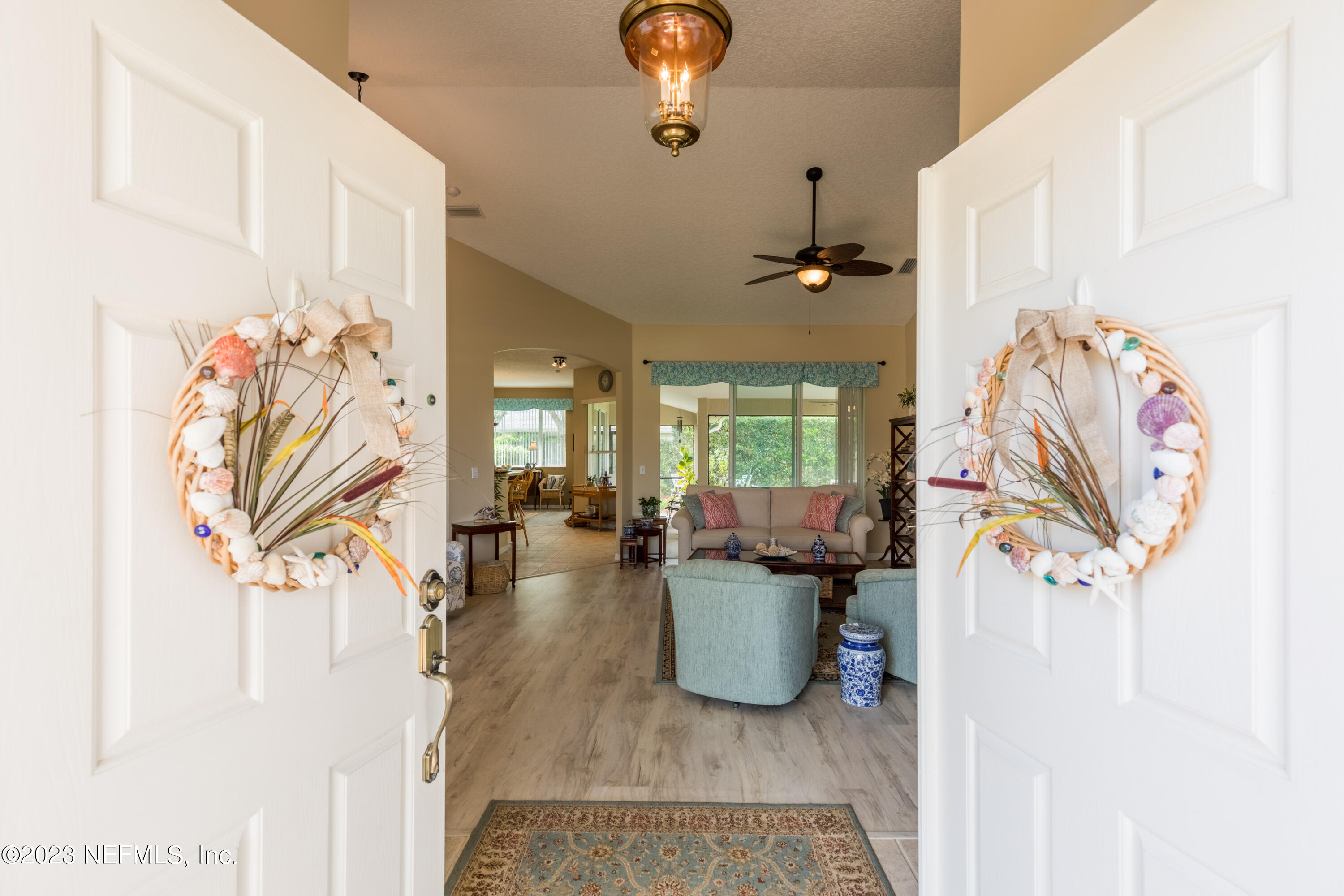 293 San Nicolas Way St. Augustine, FL 32080 - Photo 7 of 51 a view of an entryway with wooden floor