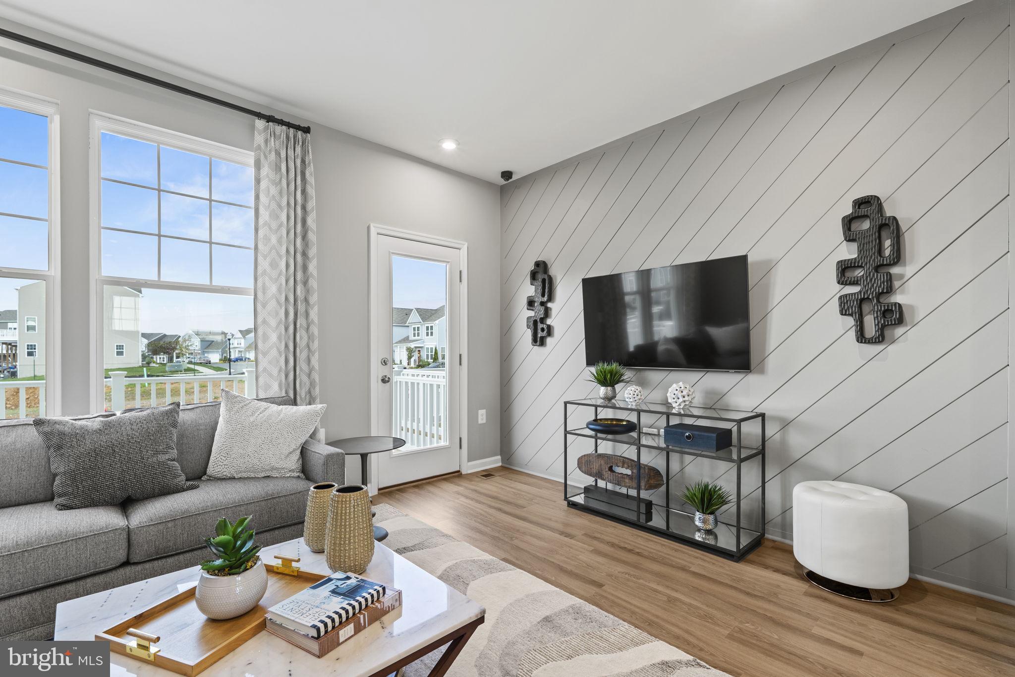 308 Presidents Pointe Avenue, Unit 611 Ranson, WV 25438 - Photo 74 of 87 Hastings- Great Room staged