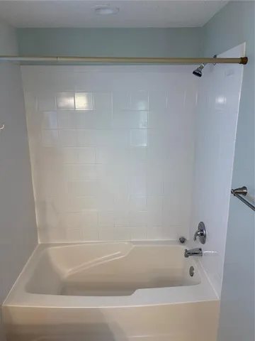 a backyard of house with yard and outdoor seating