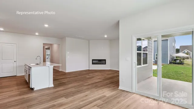 a kitchen with sink and window