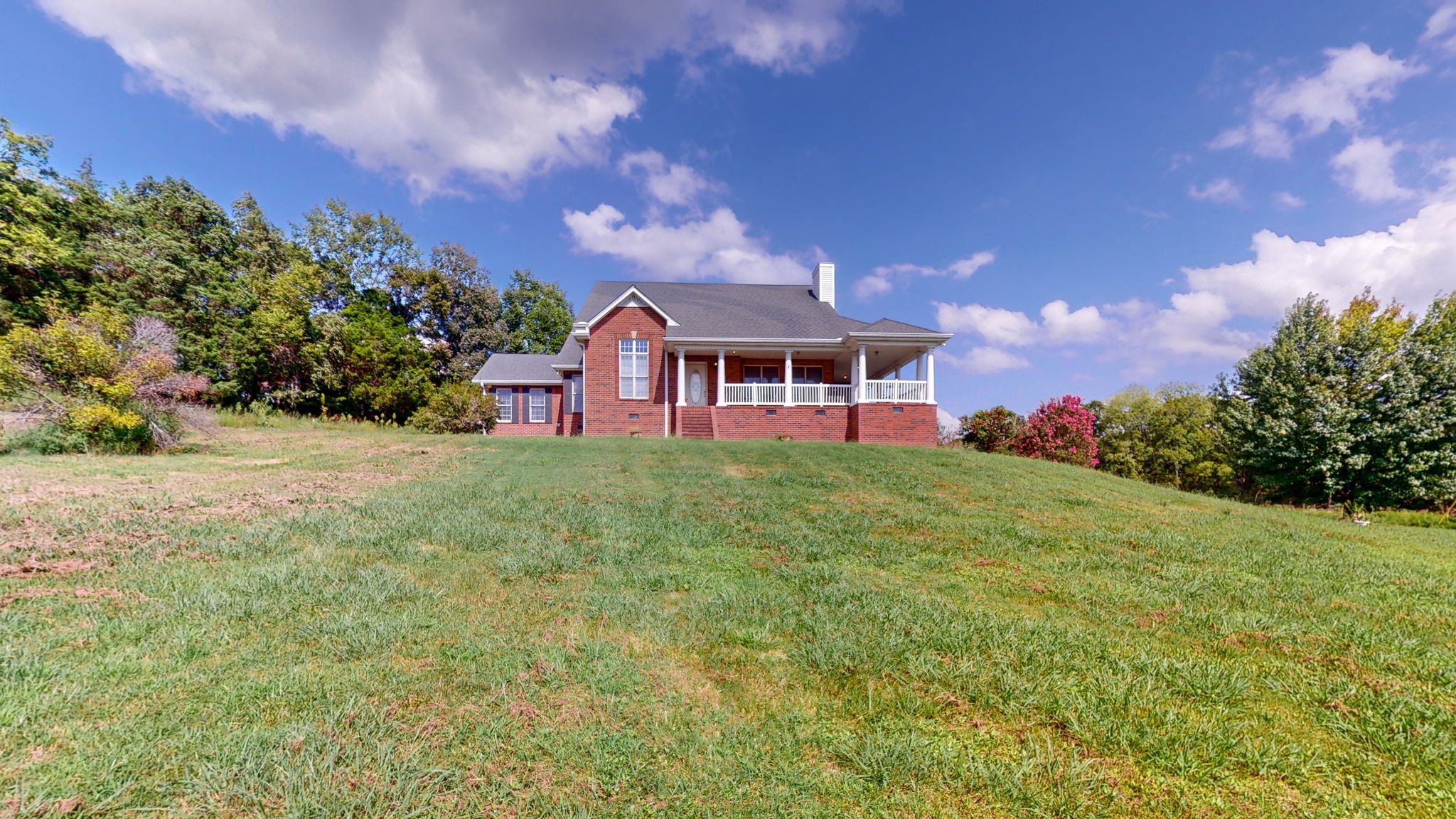1985 Linwood Road Watertown, TN 37184 - Photo 2 of 57 a front view of a house with a yard