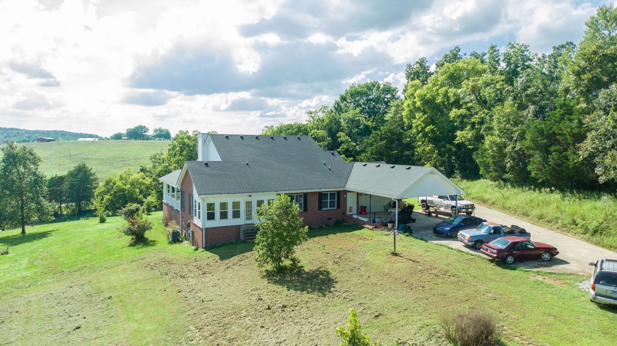 1985 Linwood Road Watertown, TN 37184 - Photo 21 of 57 a view of a house with a yard and sitting area