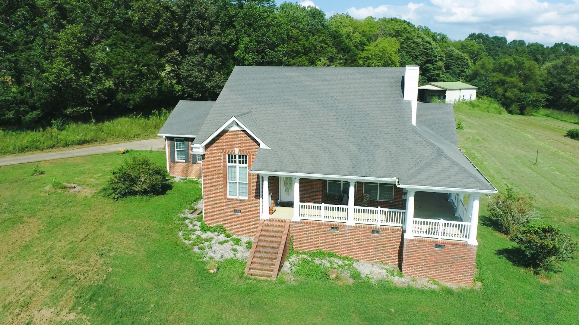 1985 Linwood Road Watertown, TN 37184 - Photo 22 of 57 a aerial view of a house with a yard