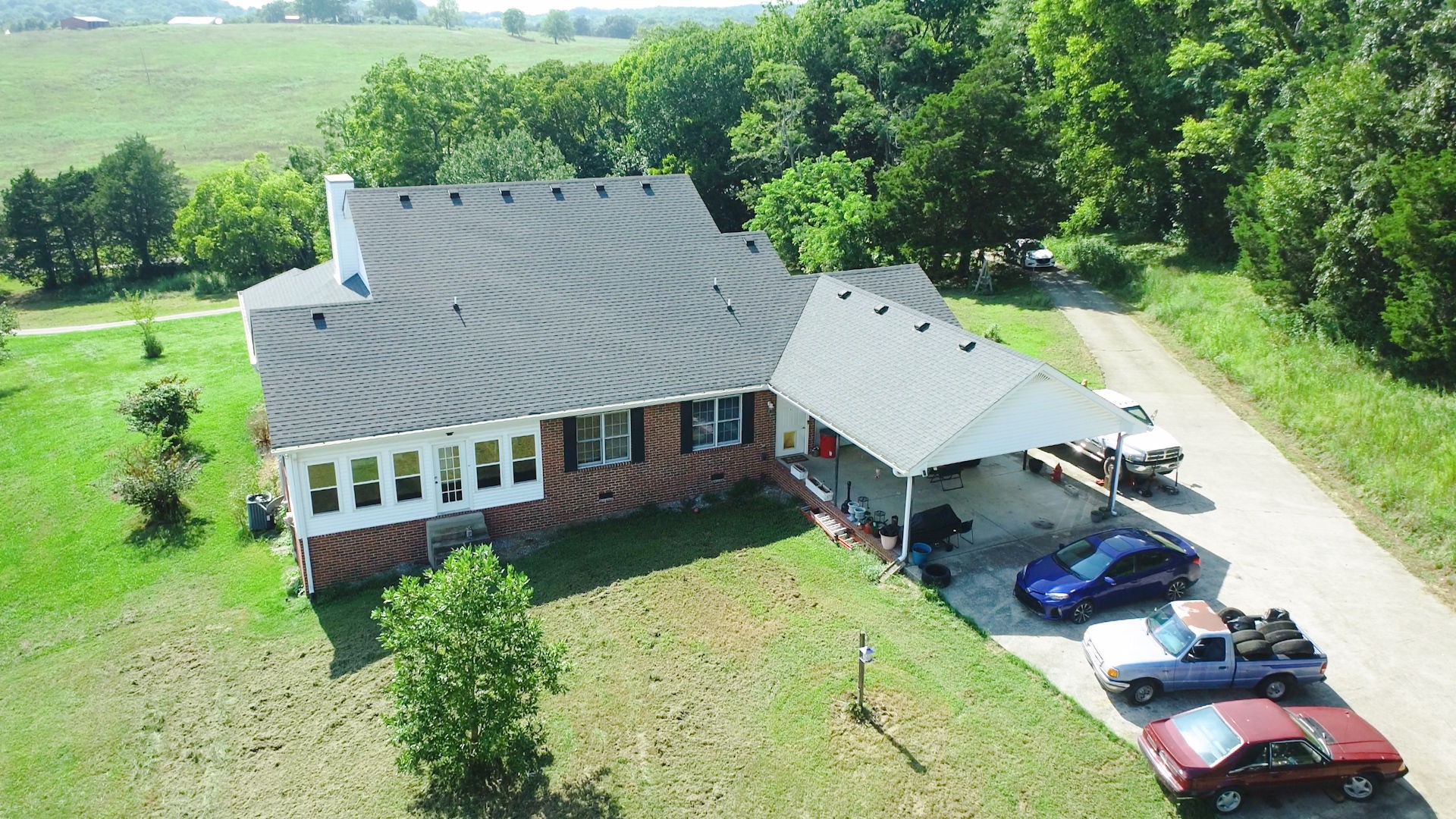 1985 Linwood Road Watertown, TN 37184 - Photo 24 of 57 an aerial view of a house with a yard and balcony