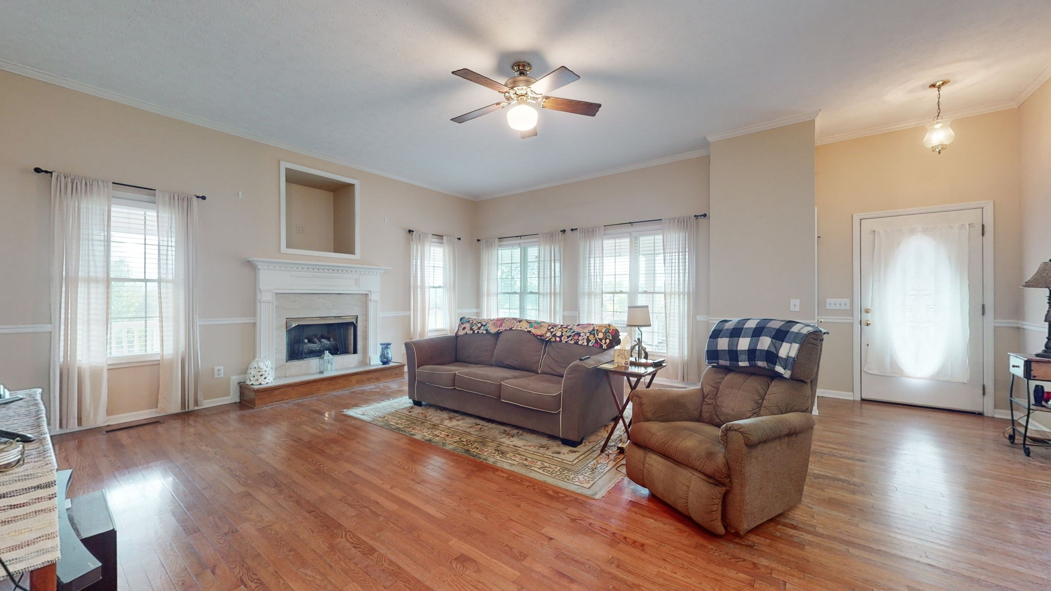 1985 Linwood Road Watertown, TN 37184 - Photo 30 of 57 a living room with furniture and a fireplace