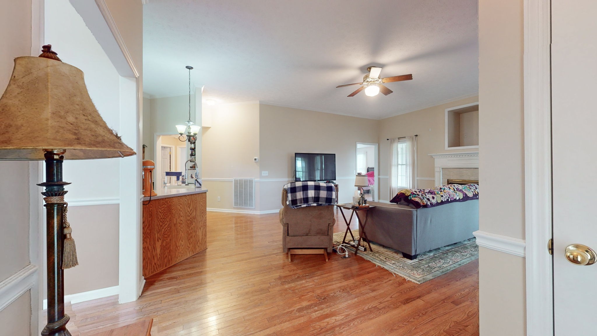 1985 Linwood Road Watertown, TN 37184 - Photo 33 of 57 a living room with furniture and a chandelier