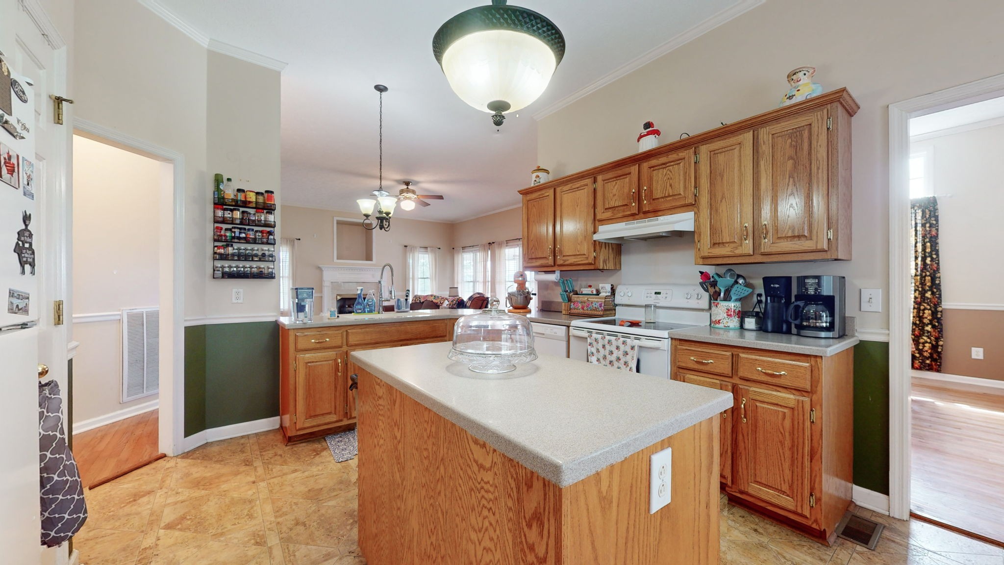 1985 Linwood Road Watertown, TN 37184 - Photo 39 of 57 a kitchen with stainless steel appliances granite countertop a sink a stove and a refrigerator