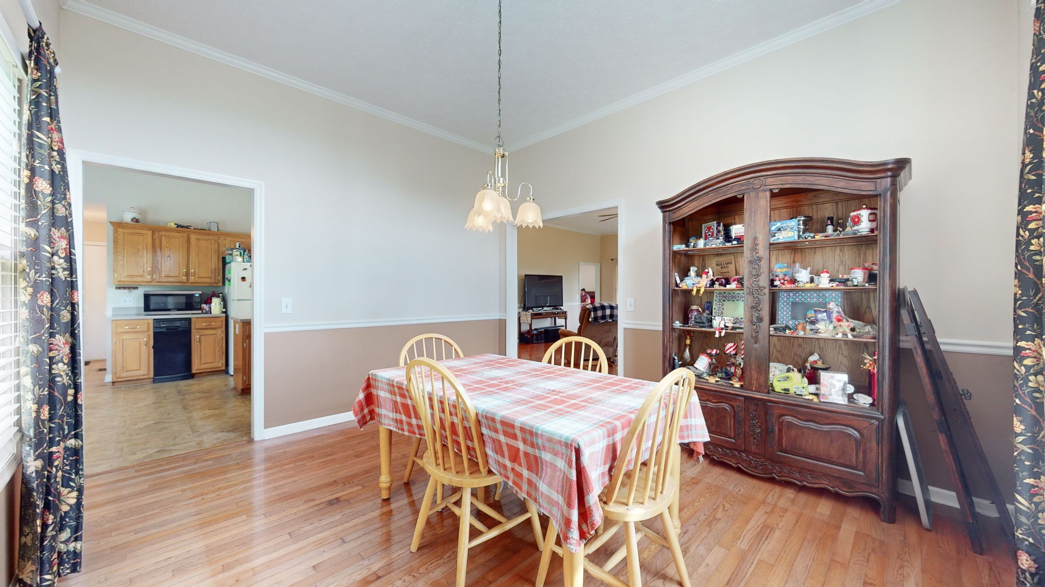 1985 Linwood Road Watertown, TN 37184 - Photo 44 of 57 a view of a dining room with furniture and wooden floor