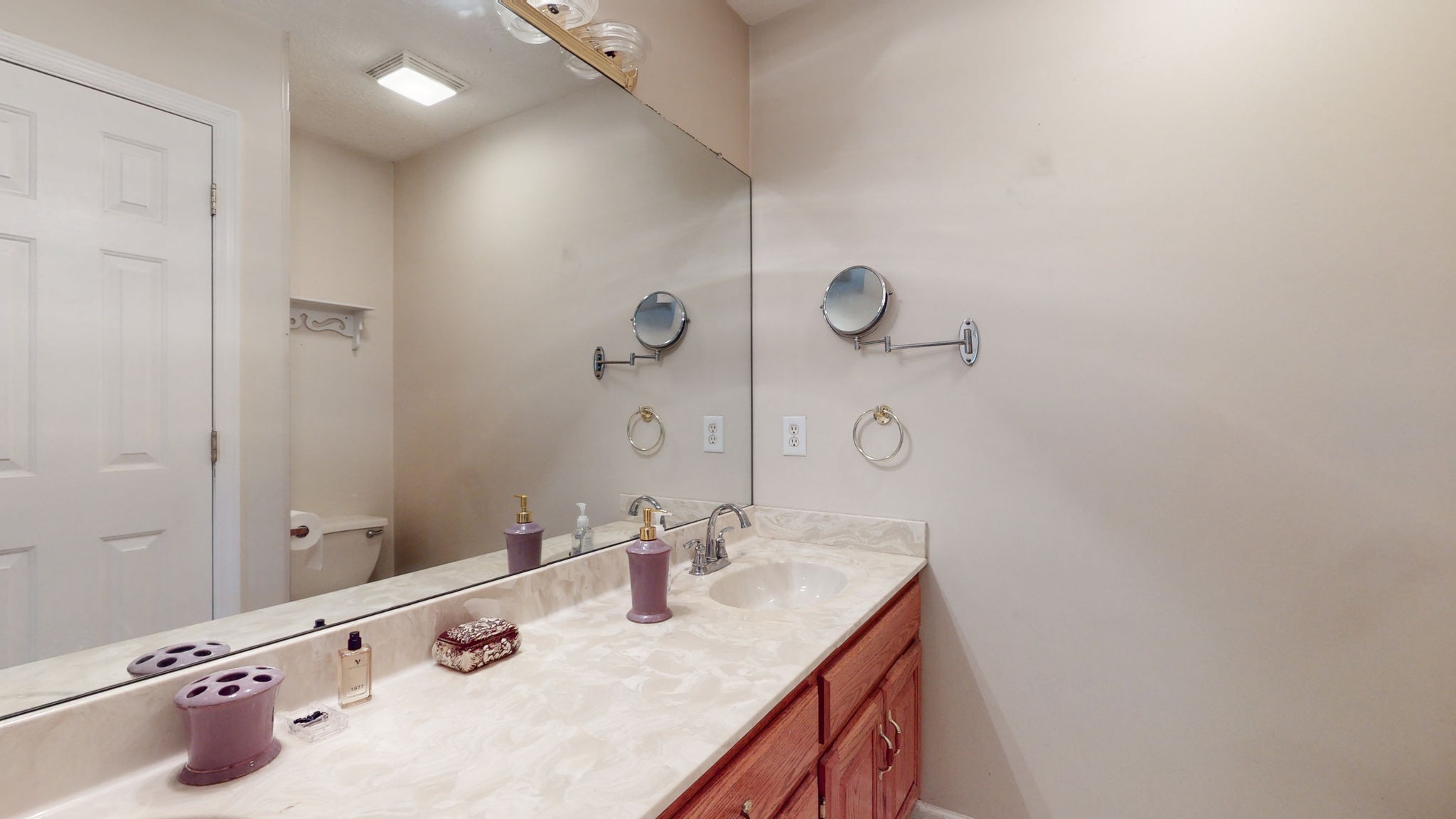 1985 Linwood Road Watertown, TN 37184 - Photo 50 of 57 a bathroom with a sink and a mirror