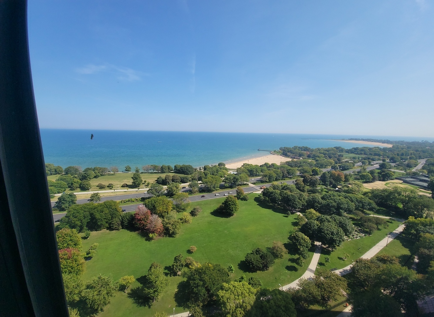 5415 North Sheridan Road, Unit 2805 Chicago, IL 60640 - Photo 12 of 23 an aerial view of residential houses with outdoor space and trees
