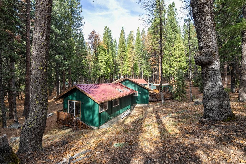 58882 Little Long Valley Creek Road Cromberg, CA 96103 - Photo 24 of 28 a view of a house with a yard and wooden fence