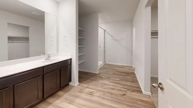 a view of an empty walk in closet