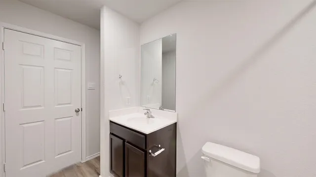 a bathroom with a shower and a toilet