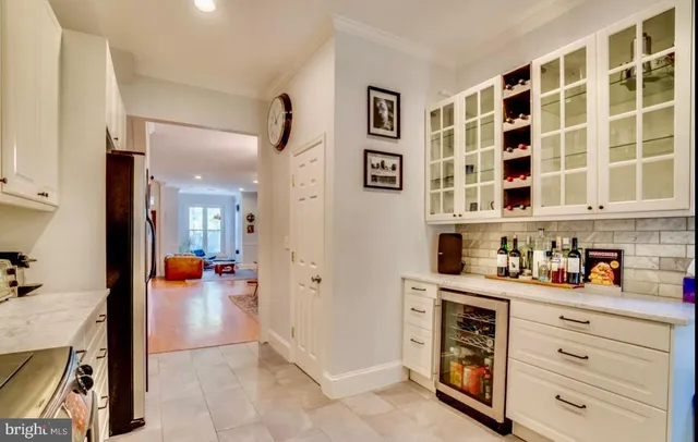 a view of a kitchen and utility room