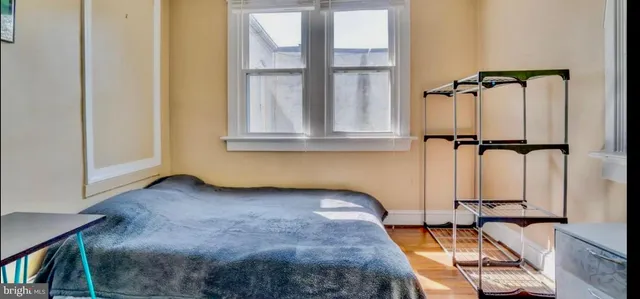 a view of a living room with a bed