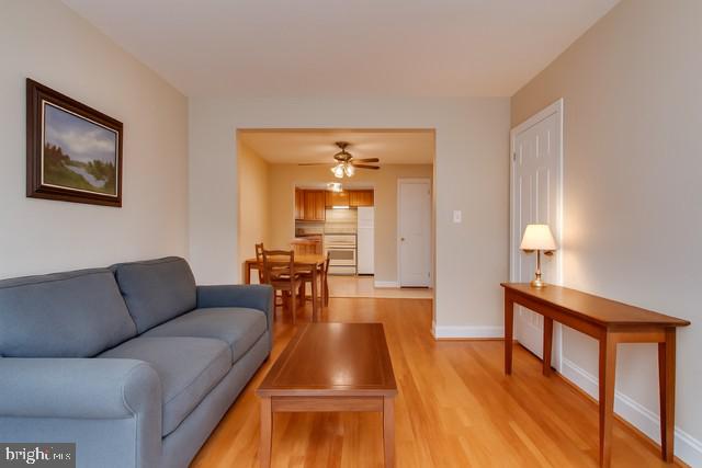 726 3rd Street Northeast Washington, DC 20002 - Photo 7 of 41 a living room with furniture and a wooden floor