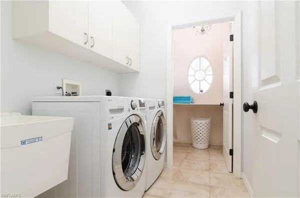 a utility room with dryer and washer