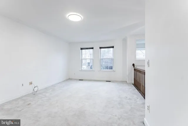 an empty room with an entryway